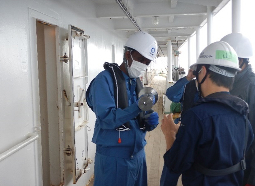 A trainee learning about an air gun